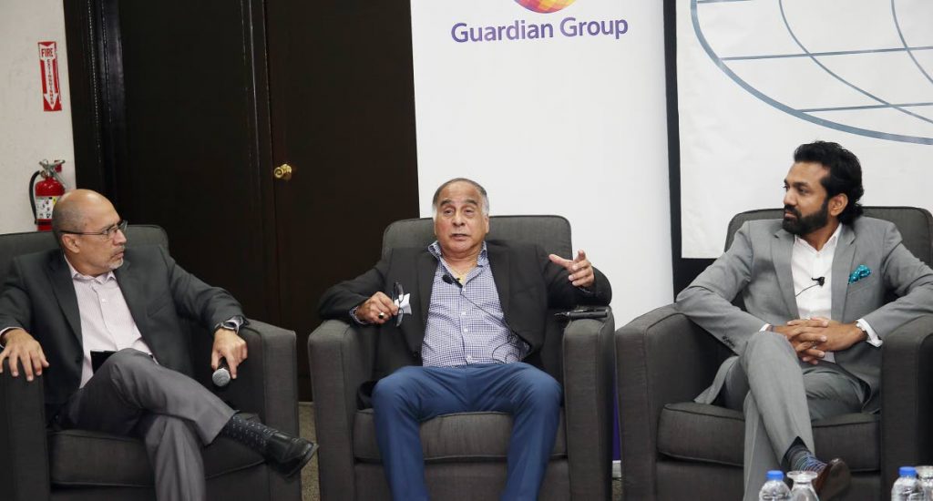 At centre Kenrick Attale executive chairman Lonsdale Saatchi & Saatchi during Wednesday’s discussion as CEO of the TT Chamber Gabriel Faria (left) and Ainsley Rajkumar GM Goddard catering group events, listen.