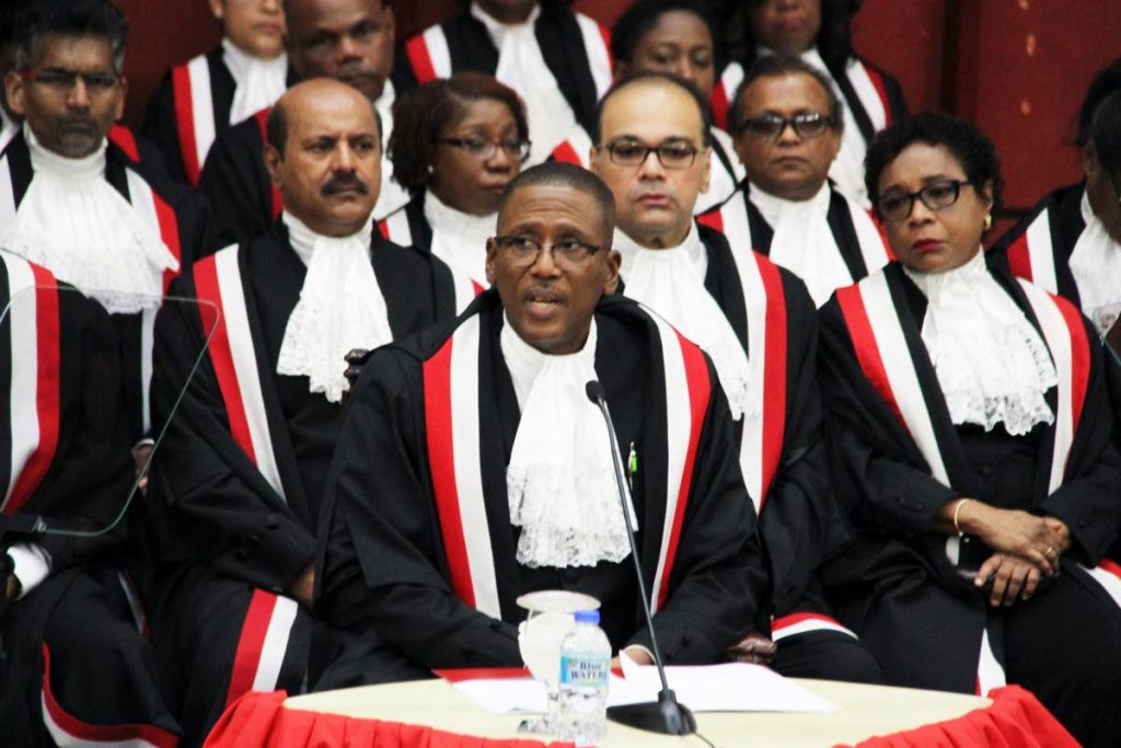 File photo: Flanked be members of the bench, Chief Justice Ivor Archie speaks yesterday during the ceremonial opening of the 2018/2019 law term at the Hall of Justice. PHOTO BY SUREASH CHOLAI