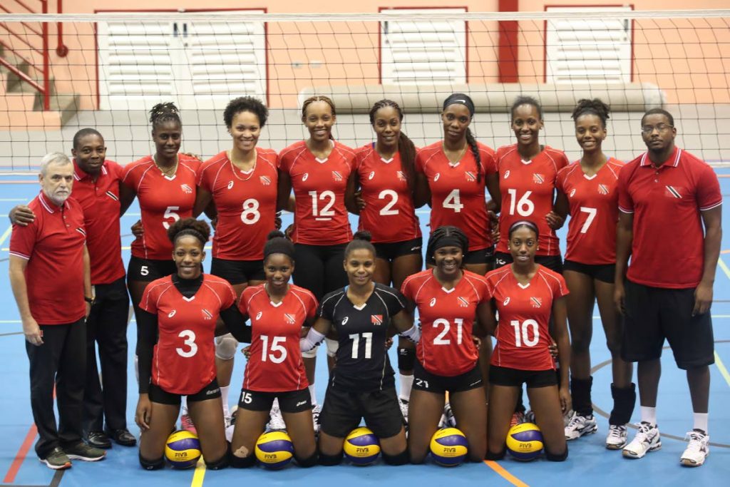 The Women's Senior National Volleyball team pose for photo prior to a final local scrimmage ahead of FIVB Women's Championships against UWI men's team at UWI SPEC, St. Augustine, yesterday. Photo: Allan V. Crane/CA-images