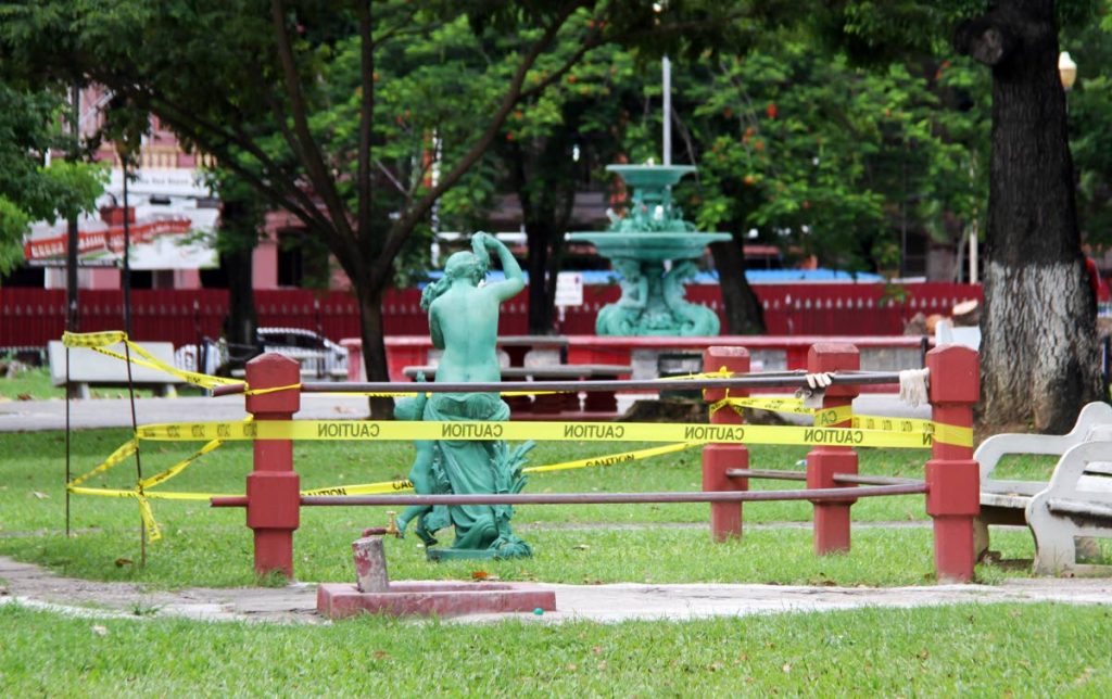 The 150-year-old statue of Aphrodite, the Greek Goddess of love, at the water fountain in Woodford Square, Port of Spain,  was taken down by city corporation workers for repair work. PHOTO SUREASH CHOLAI    