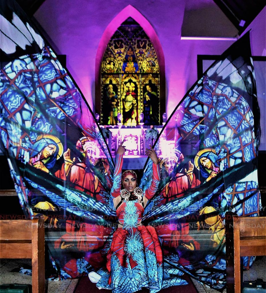 The Divine: Amare spreads her wings across the aisle of All Saints Anglican Church, Port of Spain sharing
love in K2K Alliance and Partner’s 2019 Christian-centric themed Carnival presentation Through Stained Glass Windows on Friday night.  PHOTOS BY GARY CARDINEZ