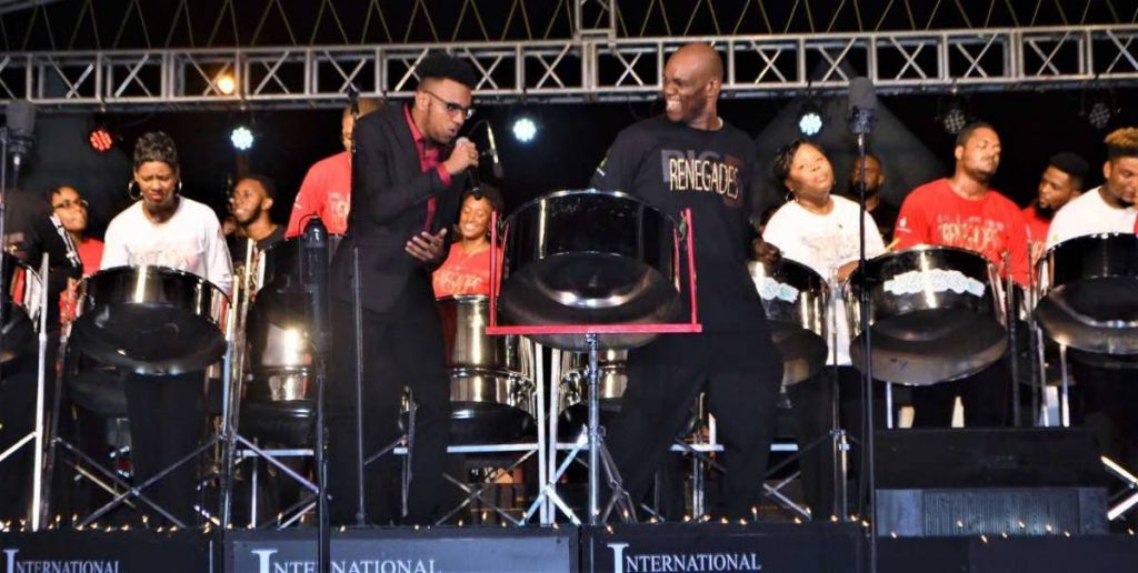 Vocalist Samuel Thomas Jr, left, performs A change is gonna come during BP Renegades’ performance on Saturday at the Big 5 concert at the Queen’s Park Savannah in Port of Spain.