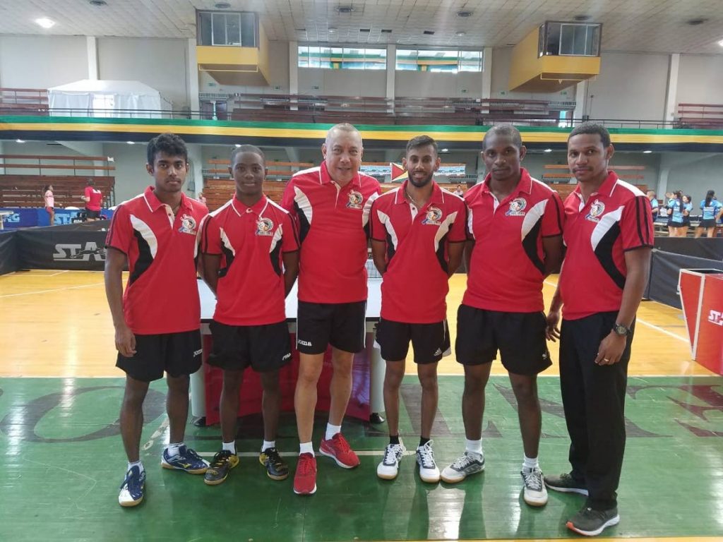 TT table tennis men (from left) Arun Roopnarine, Derron Douglas (U-21), coach Ian Joseph, Yuvraaj Dookram, Curtis Humphreys and manager Sherdon Pierre in Jamaica. 