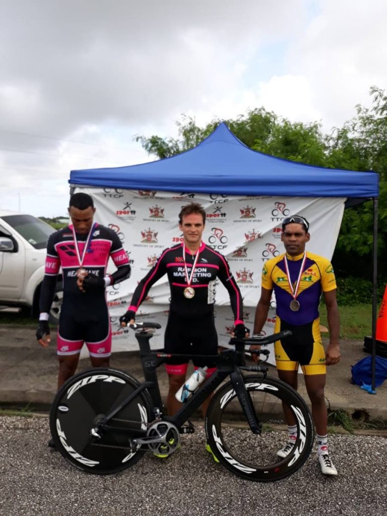 Time trial winner Christopher Govia, centre, second place finisher Sheldon Ramjit, right, and third place finisher Marcus Carvalho.