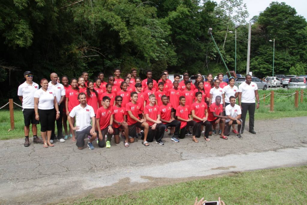 Members of the National Carifta Triathlon team pose for a photograph along with some of the coaches and members 
of the Trinidad and Tobago Triathlon Federation (TTTF) executive. Photo courtesy TTTF