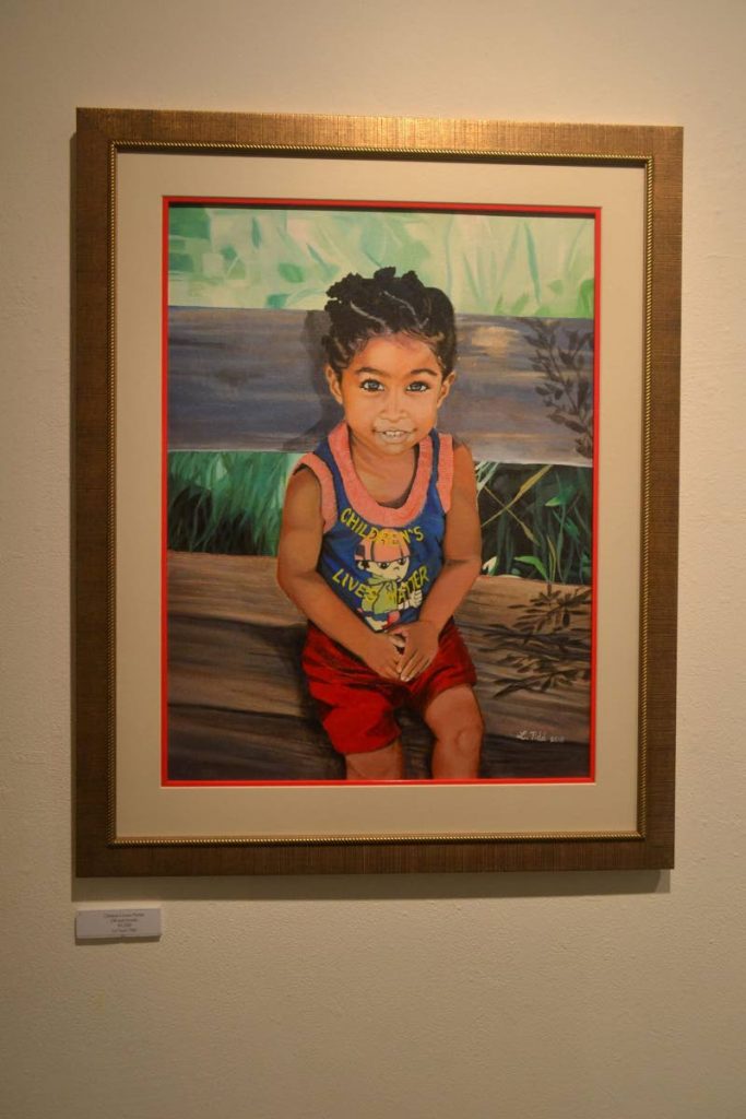 Children's Lives Matter by LaToya Tidd won the prize for best Oil Painting at the WIAOTT Voices exhibition.