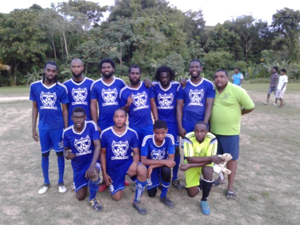 Dream Team players and their manager after beating Take That and Cool It in the Fishing Pond 9-a-side Football League recently.