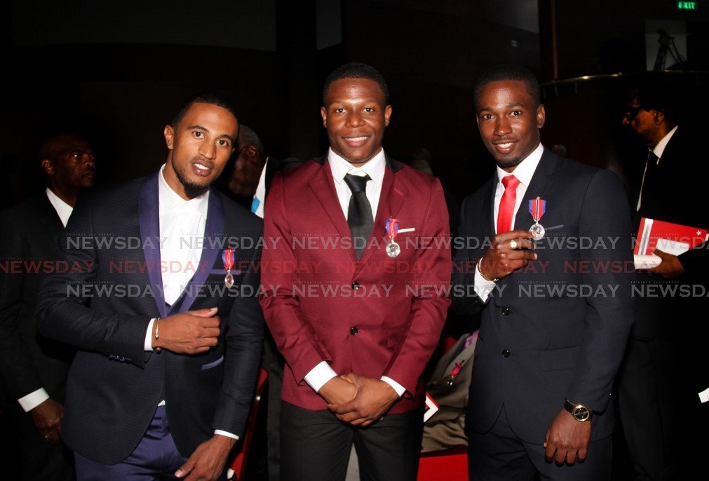 Our top cyclists were recipeints of the Humming Bird Medal Silver From left is Njisane Phillip , Nicholas Paul and Kwesi Browne at the National Awards, National Academy for the Performing Arts, Port of Spain. PHOTO SUREASH CHOLAI