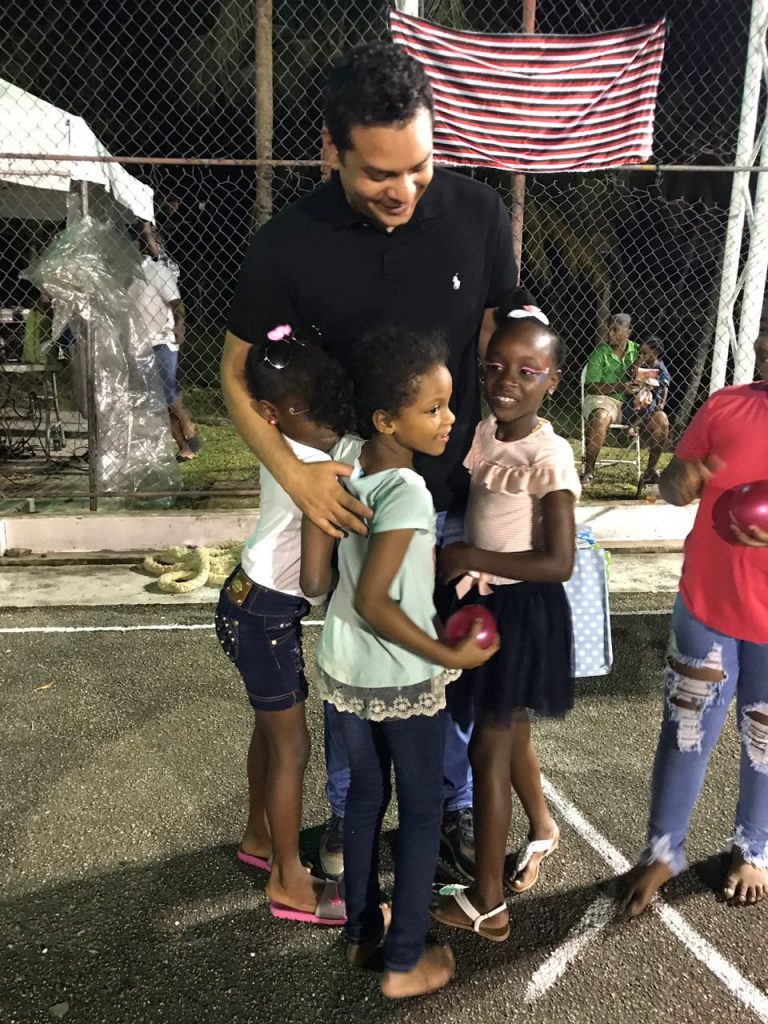 San Fernando MP Randall Mitchell with children from his constituency.