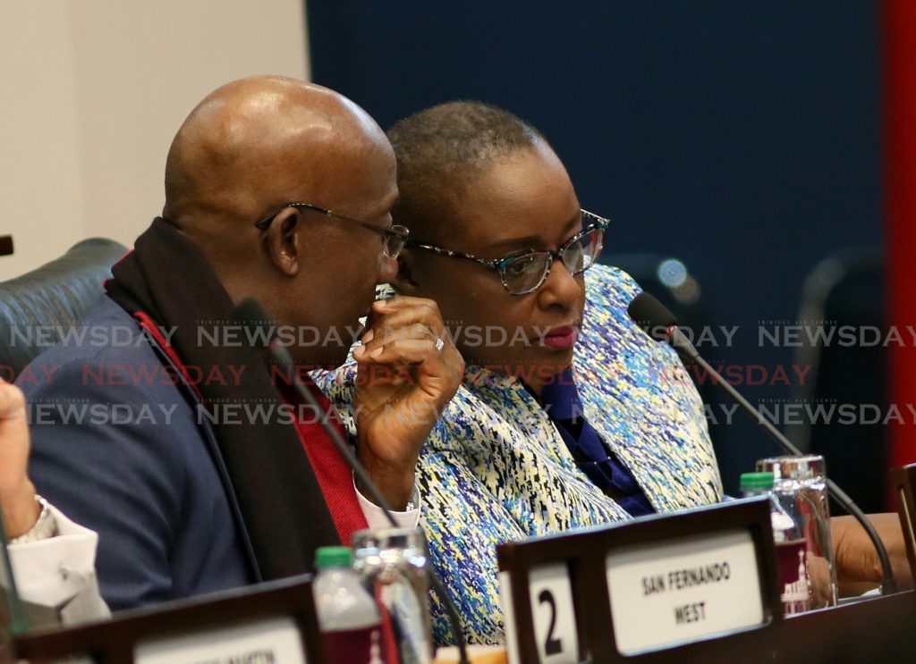 Prime Minster Dr Keith Rowley speaks to Planning Minister Camille Robinson-Regis in Parliament during the 2019 budget presentation. Photo by Azlan Mohammed.