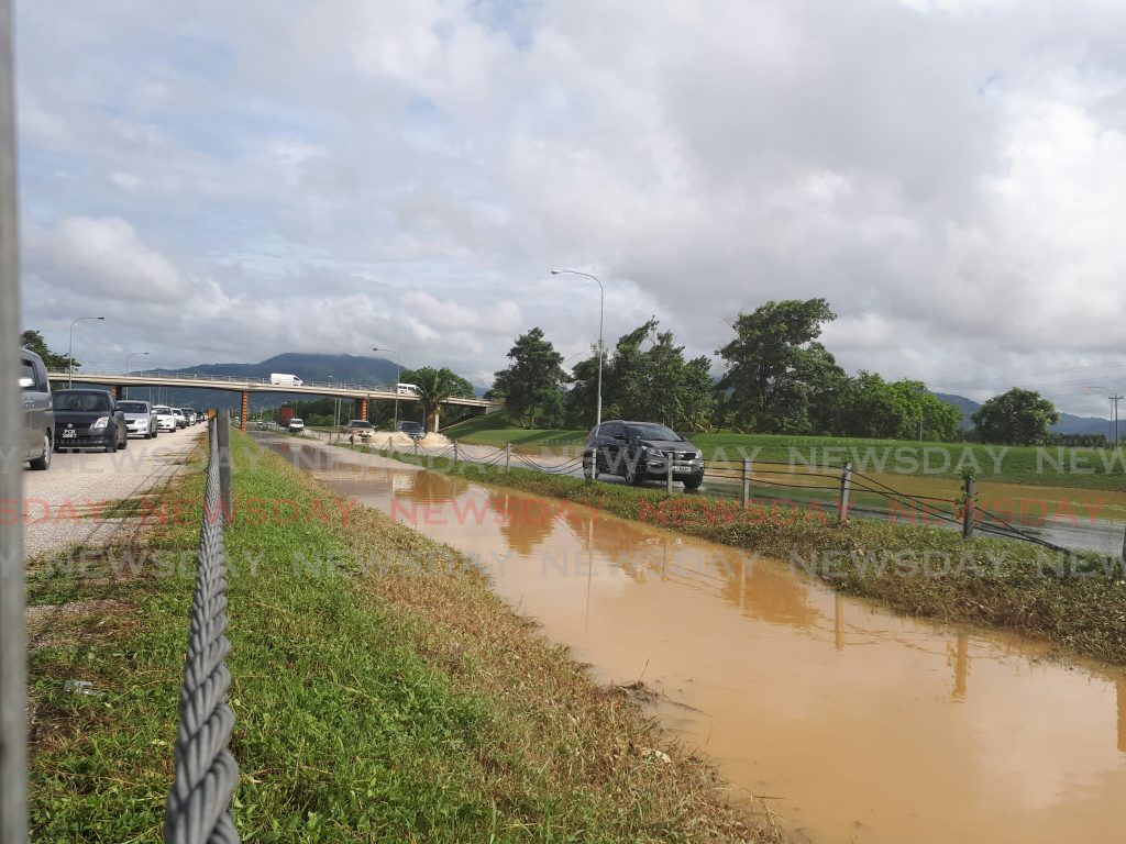 Vehicles drive on the northbound and southbound lanes of the Uriah Butler Highway near  the Caroni flyover. Phot by Kalifa Sarah Clyne