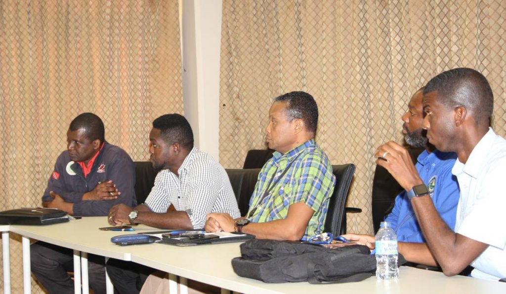 Allan Stewart, left, Director, Tobago Emergency Management Agency at a stakeholders meeting to review Tobago sargassum emergency response plan earlier this year. 
