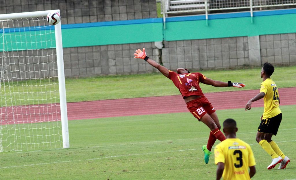 St Benedict’s College goalkeeper Leonard Richardson and teammates Andez Tallan (right) and Merlik Campbell look on as a shot from a Presentation San Fernando attacker went into the back of the net, during their SSFL match on September 26, at the Manny Ramjohn Stadium, Marabella.