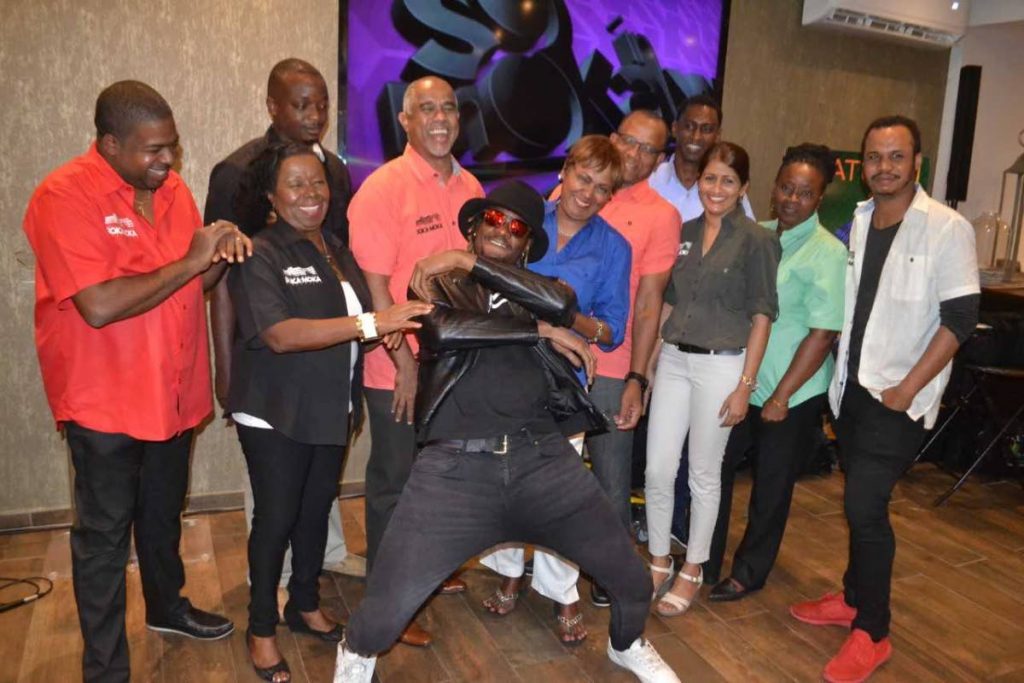 Entertainer and past student Olatunji, centre, joins the Soka in Moka committee at the launch of fete on September 26 at 54 Saddle on Maraval Road.