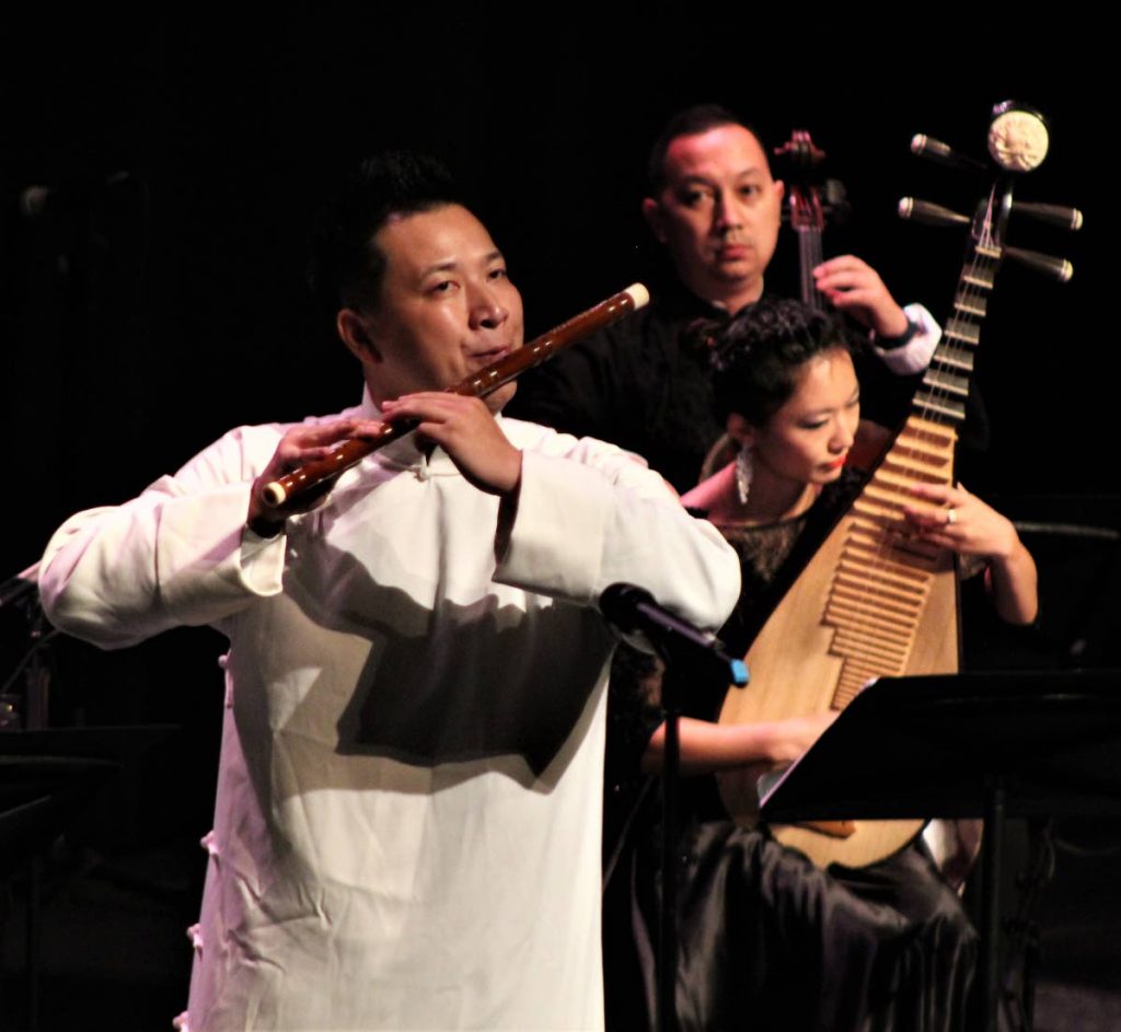 Huang Kai plays the bamboo flute with the 
Chinese Orchestra.