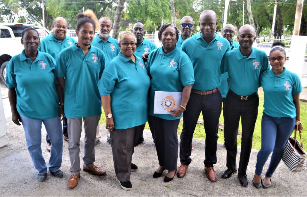 Members of Team Re-Build outside Pan Trinbago’s office on Monday.