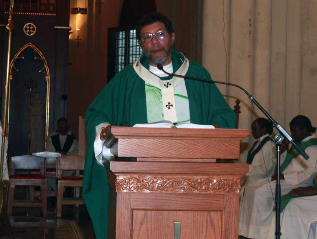MOTHER CHURCH: The Archbishop of Port of Spain Charles Jason Gordon at the first mass Wednesday since the re-opening of the Port of Spain Cathedral after it was damaged by earthquake.
PHOTO BY ENRIQUE ASSOON