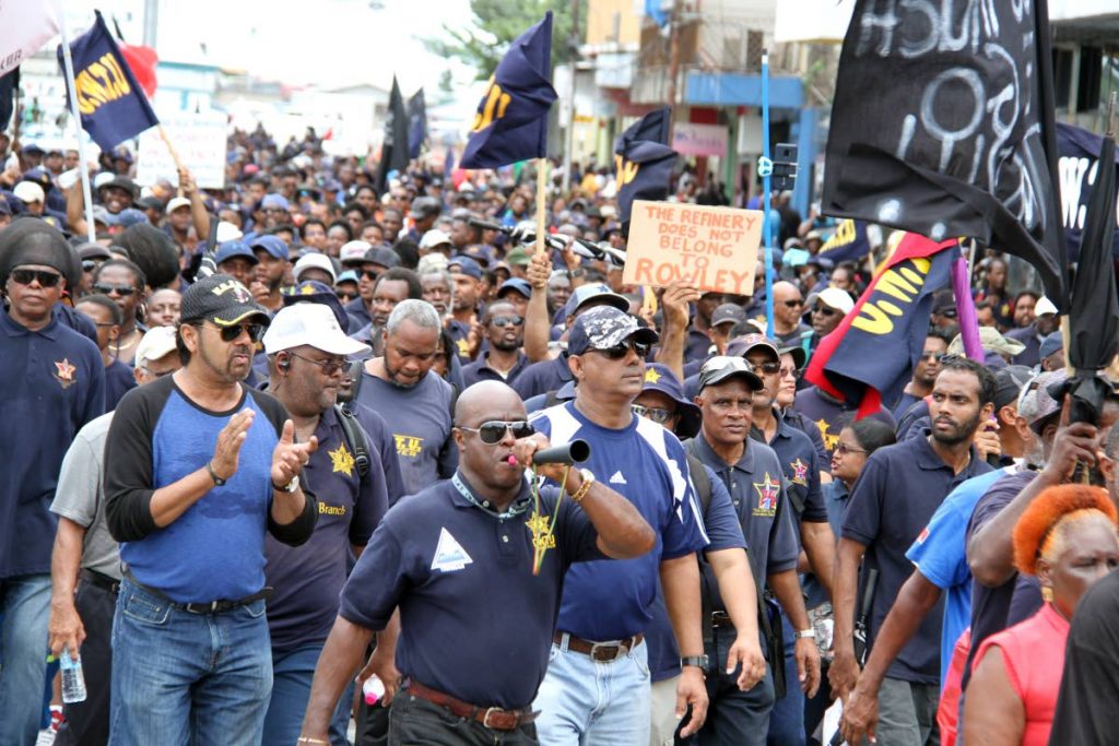 OWTU members chant as they enter Port of Spain on the final leg of a three-day march in October, 2018, from Pointe-a-Pierre protesting the closure of state oil company Petrotrin. Photo by Sureash CholaI