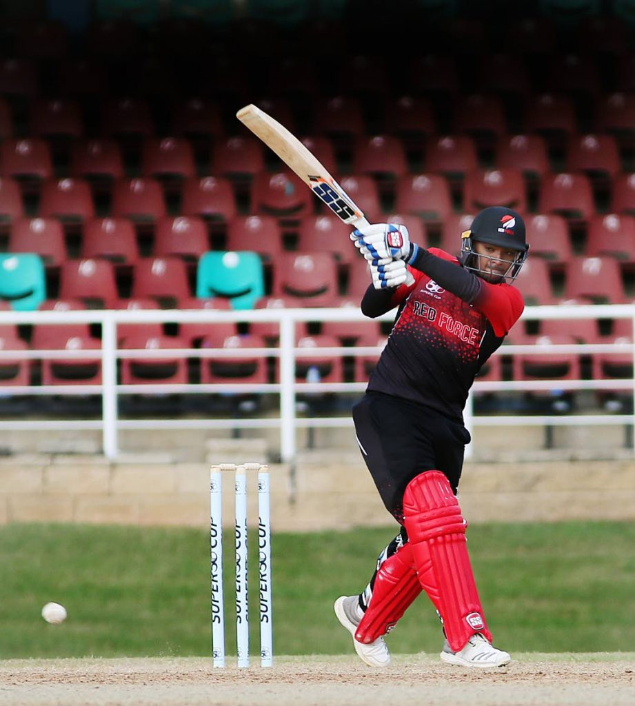 TT Red Force's Nicholas Pooran hooks a shot for a boundary against the Guyana Jaguars, in a Super50 match, at the Queen's Park Oval, on October 5.