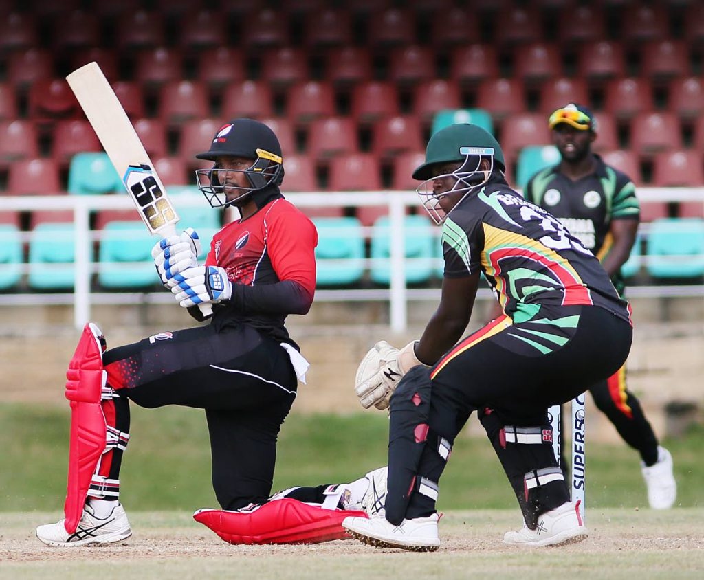 Red Force captain Denesh Ramdin batting vs Guyana Jaguars earlier this month at the Queen's Park Oval, St Clair. 