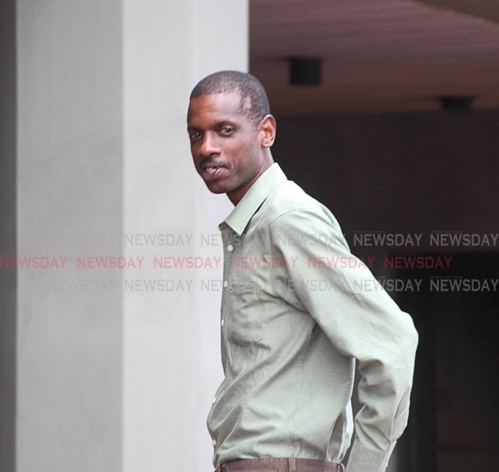 Garth Richards leaving the Hall of Justice yesterday.
Photo by Enrique Assoon.