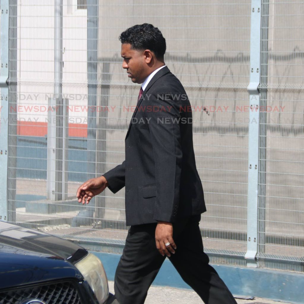 PC Shazard Ali was seen leaving the Chaguanas Magistrates court yesterday after appearing for stealing money PHOTO BY: ANSEL JEBODH