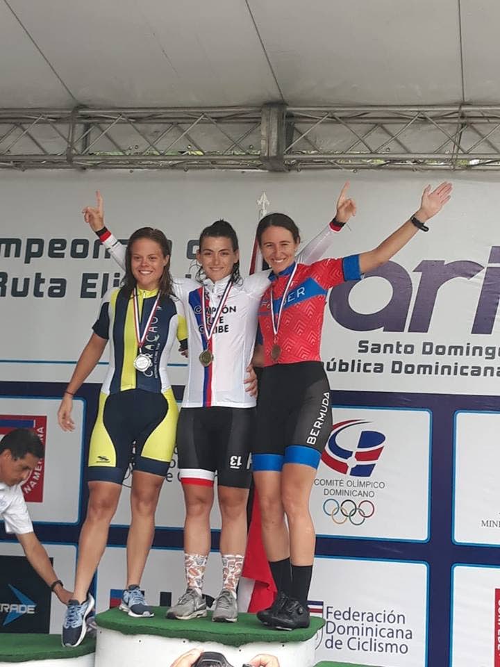 TT cyclist Alexi Costa, centre, after winning the time trial. Lisa Groothuesheidkamp of Curacao, left, earned silver and Catlin Conyer of Bermuda took bronze.