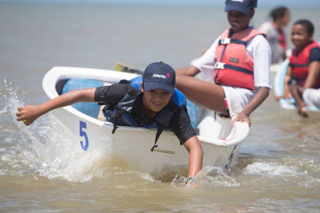 An enthusiastic young sailor at this year's Atlantic Sailing Camp. The two-day training session was recently held at Vessigny Beach and facilitated by Atlantic Sports Ambassador and two-time Olympian sailor Andrew Lewis.

 