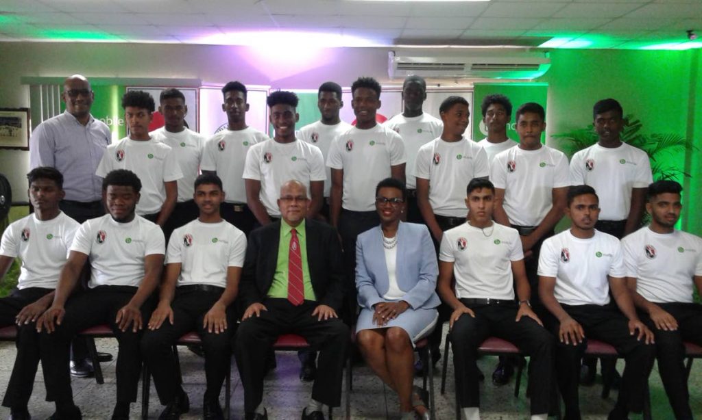 TTCB president Azim Bassarath (front row, fourth from left) and Bmobile officials Rhonda Lee Yhap (front row, fourth from right) and Graham Suite (back row, left) pose with the 2018 Bmobile TTCB Cricket Academy inductees at yesterday’s launch.