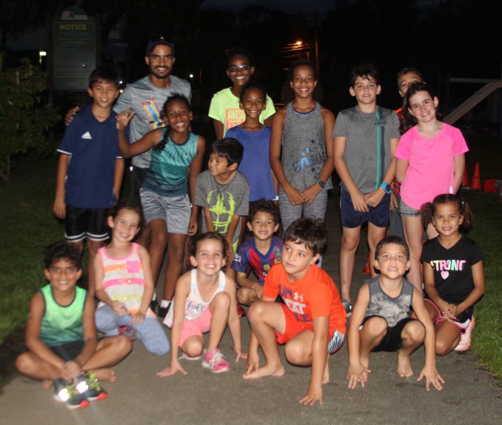 Dunross Preparatory School coach after training students in multi-sports at Riverside Park, Westmoorings 
last Tuesday .PHOTOS BY ENRIQUE ASSOON