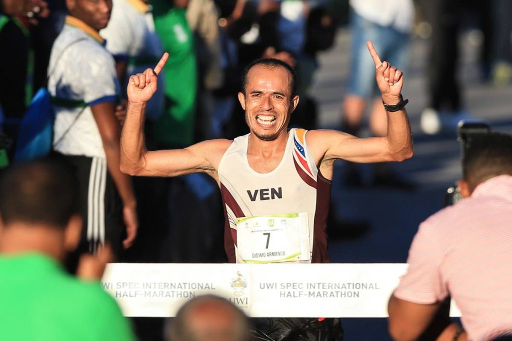 Champion of the UWISPEC International Marathon, Venezuela’s Didimo Sanches Crosses the Finishline in1:08.48 during the UWI SPEC International Half Marathon.  Photos by Allan V. Crane/CA-images