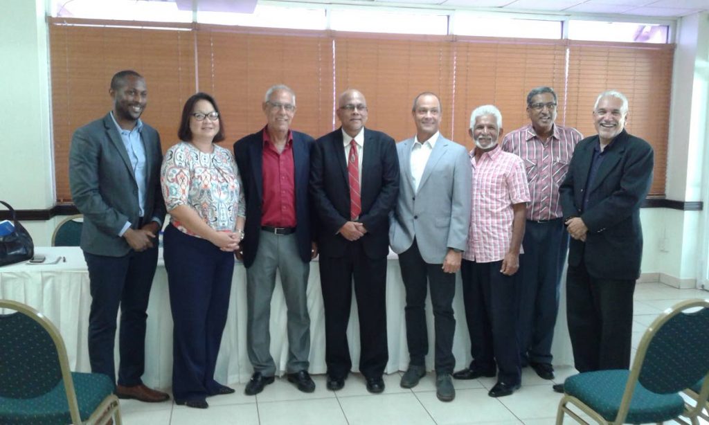 TT Cricket Board (TTCB) president Azim Bassarath (fourth from left) along with members of Cricket With Heart committee (from left) Kairon Serrette, Therese Pascall, Douglas Camacho, Colin Borde, Deryck Murray, Sukesh Maniram and Colin Murray, at yesterday’s media conference.