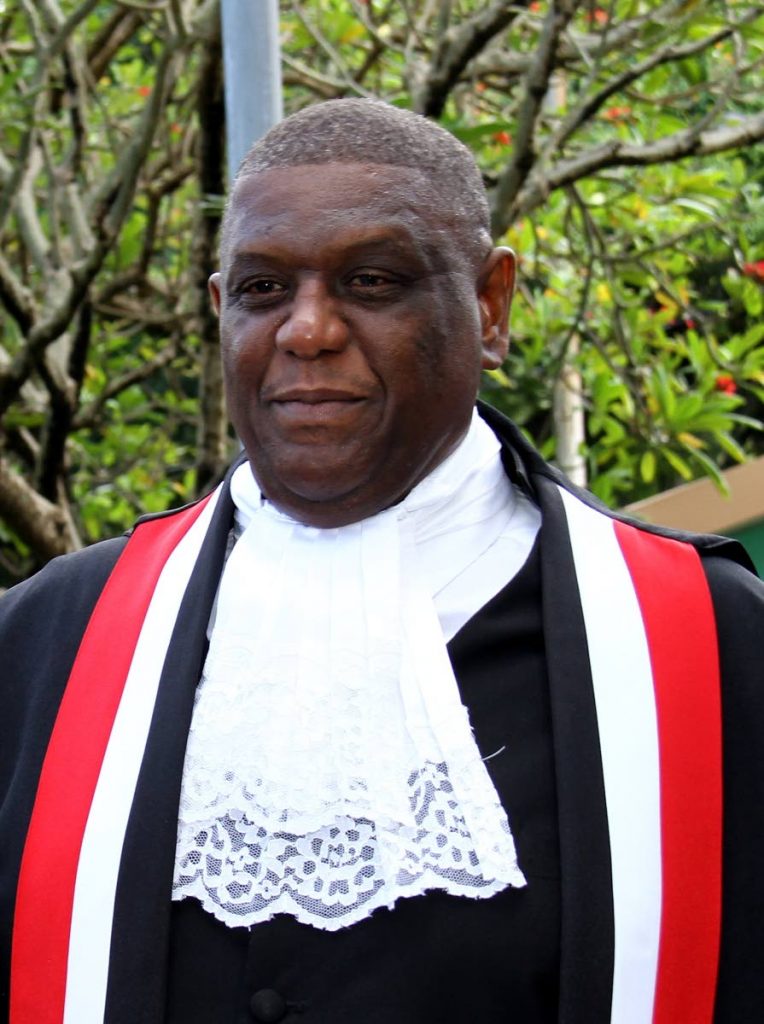 Justice Malcolm Holdip.