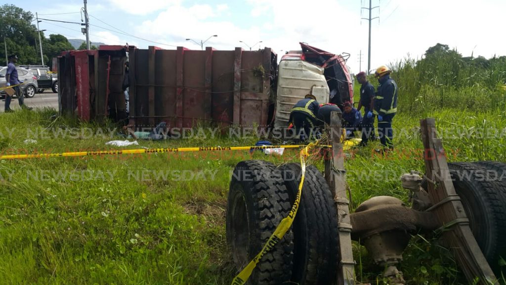 A truck overturned on the Beetham Highway after an accident on Friday morning. November 11, 2018. Photo by Roger Jacob