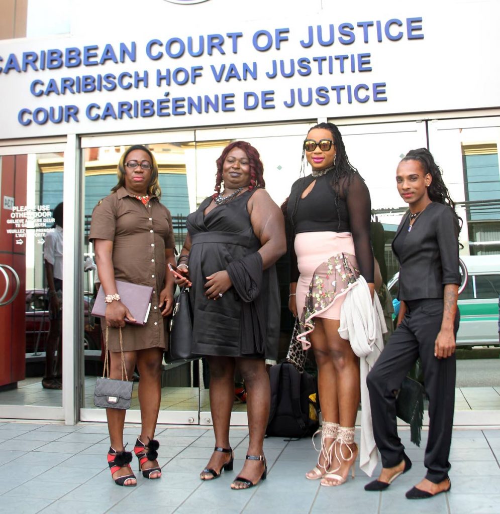 Guyanese transgender women, from left, Angel (Seon) Clarke, 
Gulliver (Quincy) McEwan, Peaches (Joseph) Fraser and Isabella (Seyon) Persaud prior to the hearing of their appeal at the Caribbean Court of Justice in Port of Spain. Photo by Angelo Marcelle