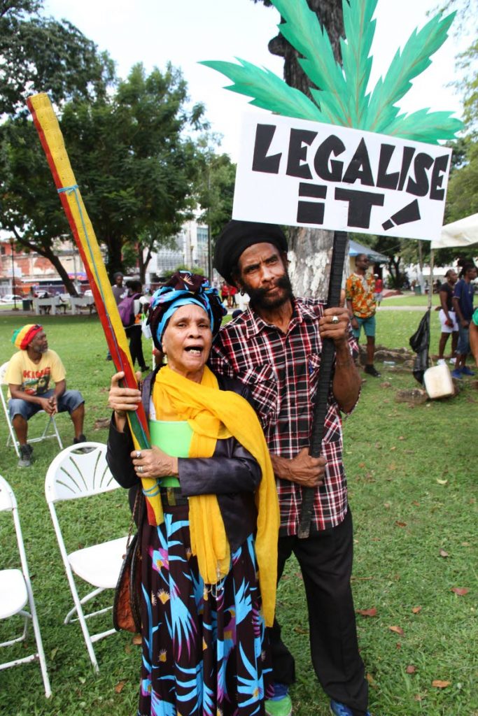 In this file photo, Theodora Ulerie (Auntie Thea) and Claude Jeffers join the call to legalise the use of marijuana during the All Mansions of Rastafari's Cannabis Rally at Woodford Square in Port of Sapin. Photo by Sureash Cholai