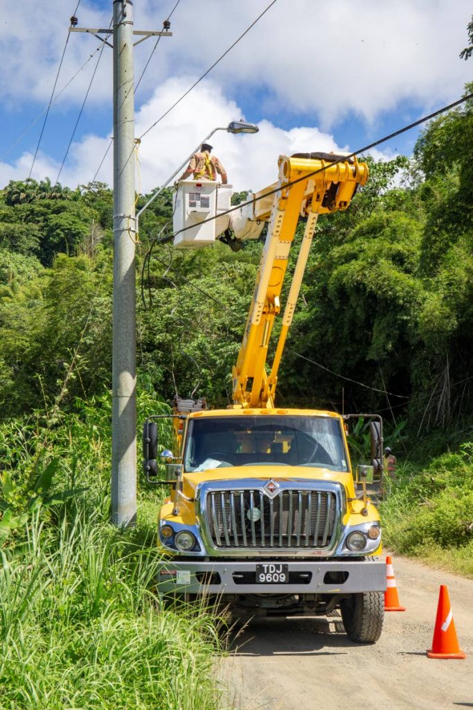A T7TEC technical crew on site at Cow Farm Road, Goldsborough in Tobago completing the installation of 19 street lights on Tuesday.