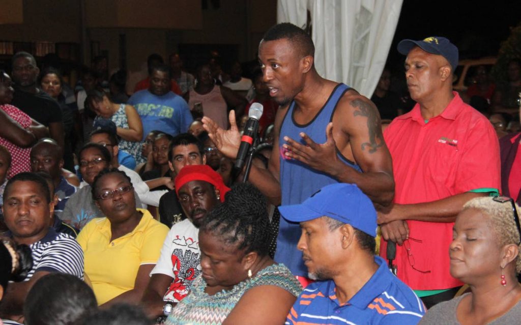 Scared of Rain: Former soldier Shaqa Wallace, pleads for empathy at community meeting for affected Greenvale Park residents hosted by HDC, Thursday night.