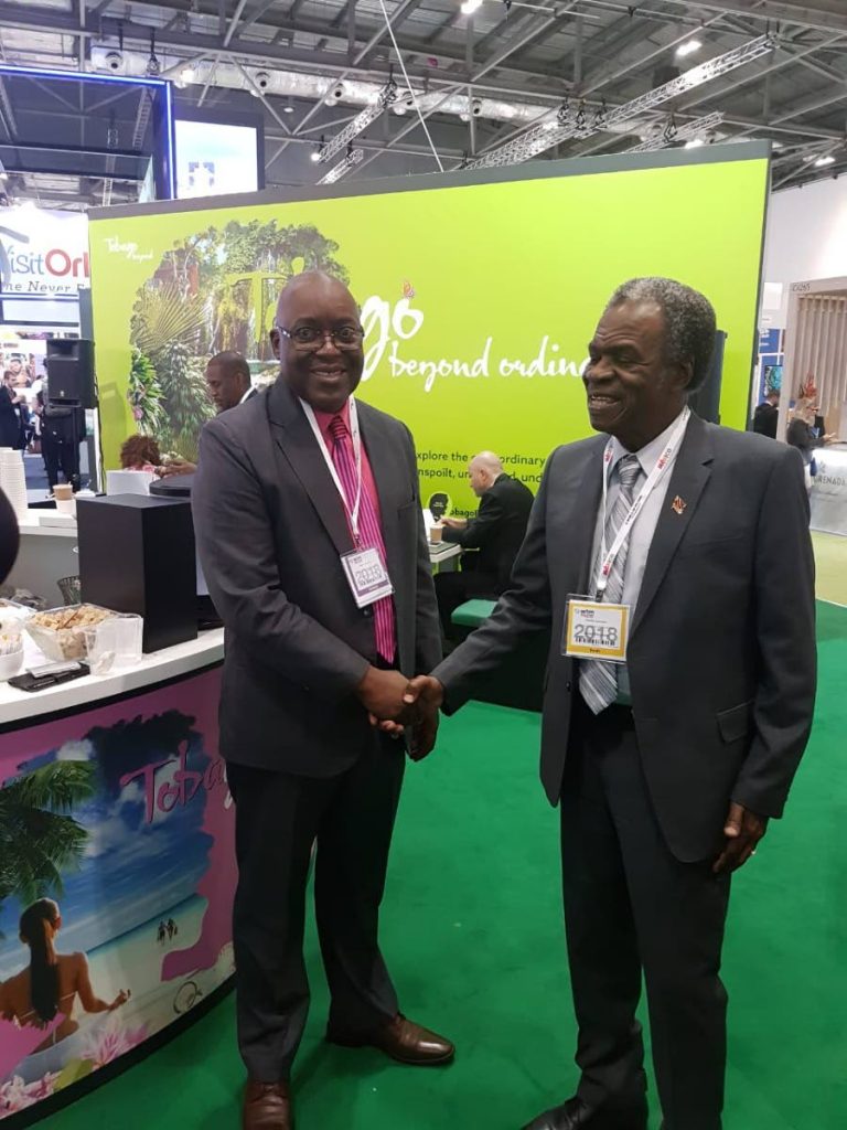 THA Chief Secretary Kelvin Charles, left, greets his predecessor Orville London, High Commissioner to the United Kingdom, at the World Travel Market, which is currently underway in the UK.