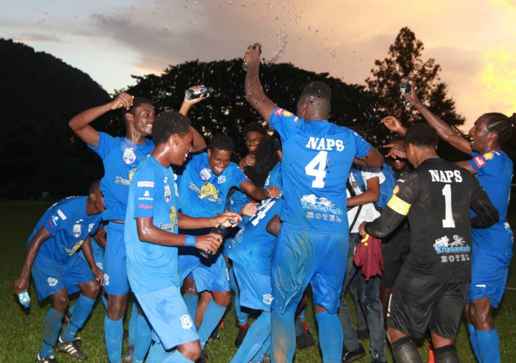 In this file photo, Members of the Naparima College team celebrate after defeating Trinity Moka 2-0 to capture the 2018 SSFL Premiere Division title at the Trinity Grounds in Moka on Wednesday.