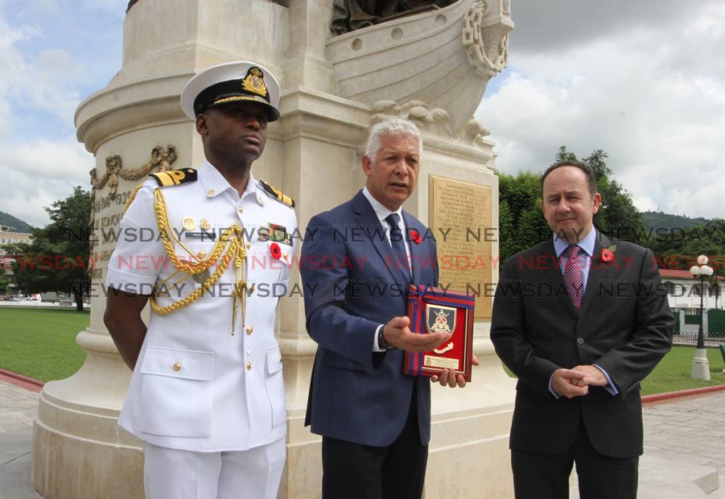 Port of Spain mayor,  Joel Martinez, flanked by Chief of Defence Staff Rear Admiral  Hayden Pritchard andBritish High Commissioner Tim Stew at the official hand-over of the memorial cenotaph, ahead of Rememberance Day observations, where military will be honouring those who fell in World War I and II. Memorial Park, Port of Spain. Friday, November 9, 2018. PHOTO BY ROGER JACOB.