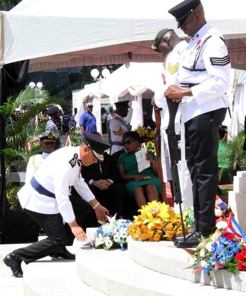 GARY REMEMBERS: Commissioner of Police Gary Griffith lays a wreath at the Cenotaph, Memorial Square in Port of Spain yesterday on the occasion of Remembrance Day.