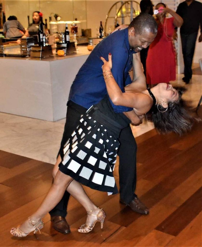 Marisa Hernandez and dance co-ordinator Wayne Sargent show off their moves.