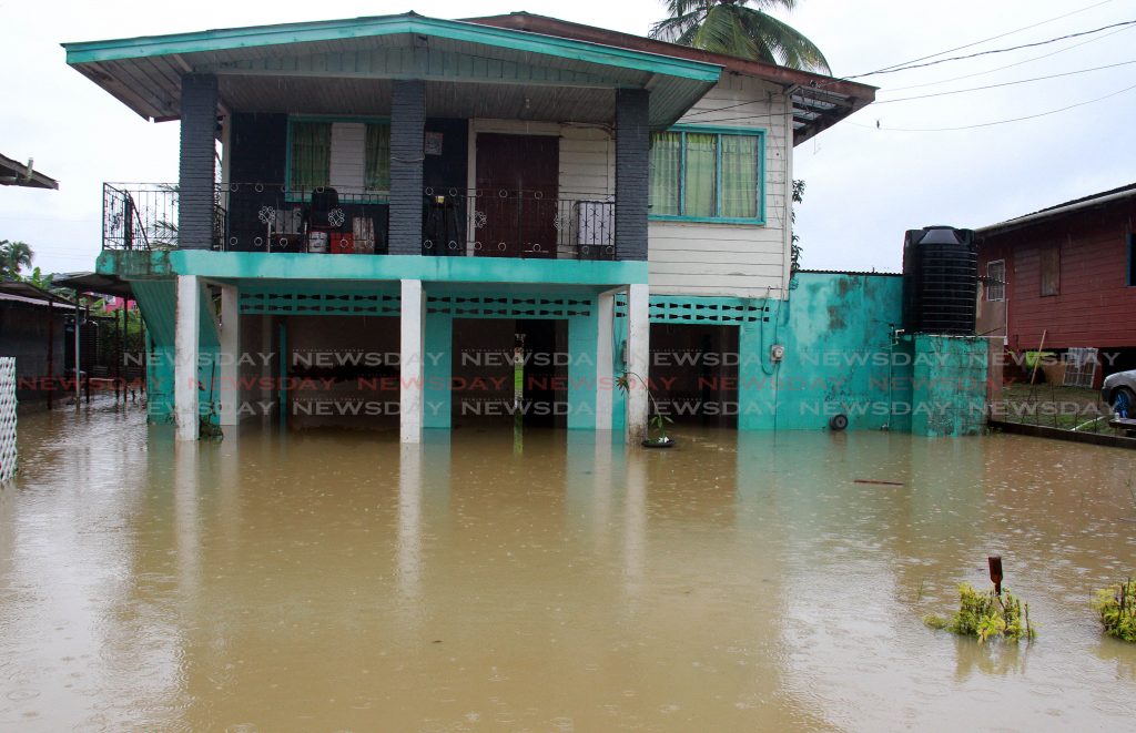 Flood waters at Debe Trace, Debe.

PHOTO BY ANIL RAMPERSAD.