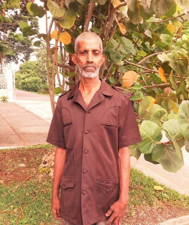 Jamal Rias Mohammed poses for a photo at his home in Bon Accord. Photo by Emerline Gordon