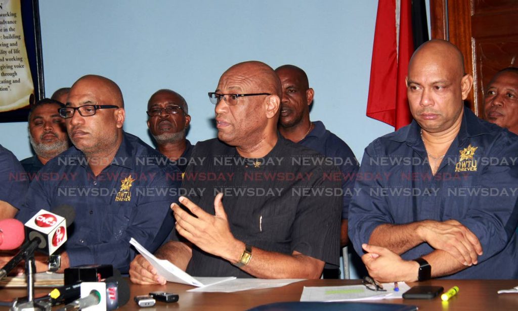 At center, President General of the OWTU Ancel Roget and other members during a press conference, which was held at Paramount Building Circular Road, San Fernando.
