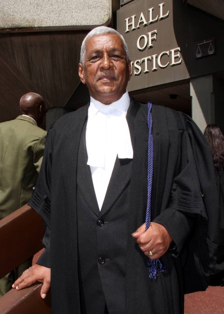 READY TO SERVE: Retired Permanent Secretary of the Public Utilities Ministry Chrisendath Mahabir, who along with 64 others, took the oath as new lawyers yesterday at the Hall of Justice in Port of Spain. PHOTO BY ROGER JACOB   