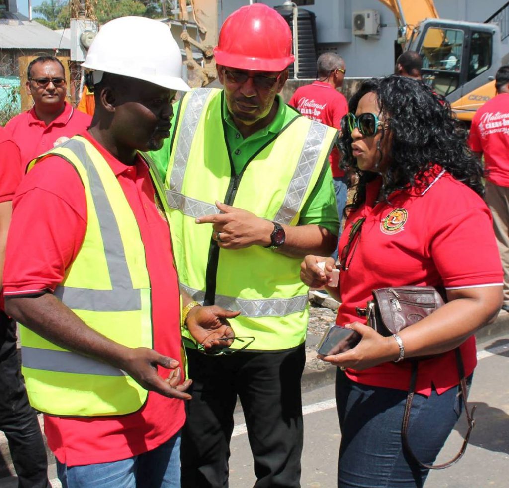 NO CONFIDENCE: Point Fortin Mayor Abdon Mason, left, who has filed a no-confidence motion against the corporation's CEO Donna-May Taylor, is seen in this photo posted on his Facebook page with CEO Taylor and Local Govt Minister Kazim Hosein, centre. 