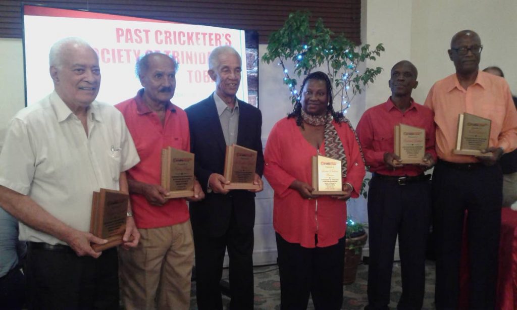 Past Cricketers Society on Saturday honoured (left-right) Bryan Davis, Narine Ragoo, Sir Gary Sobers, Louise Browne, Richard Gabriel and Noel Robinson for their contributions. 