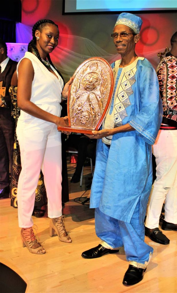 NACC’s Embau Moheni, right, presents Voice’s representative Lerissa Taylor with the Calypso of the Year Trophy.

Photos: Gary Cardinez